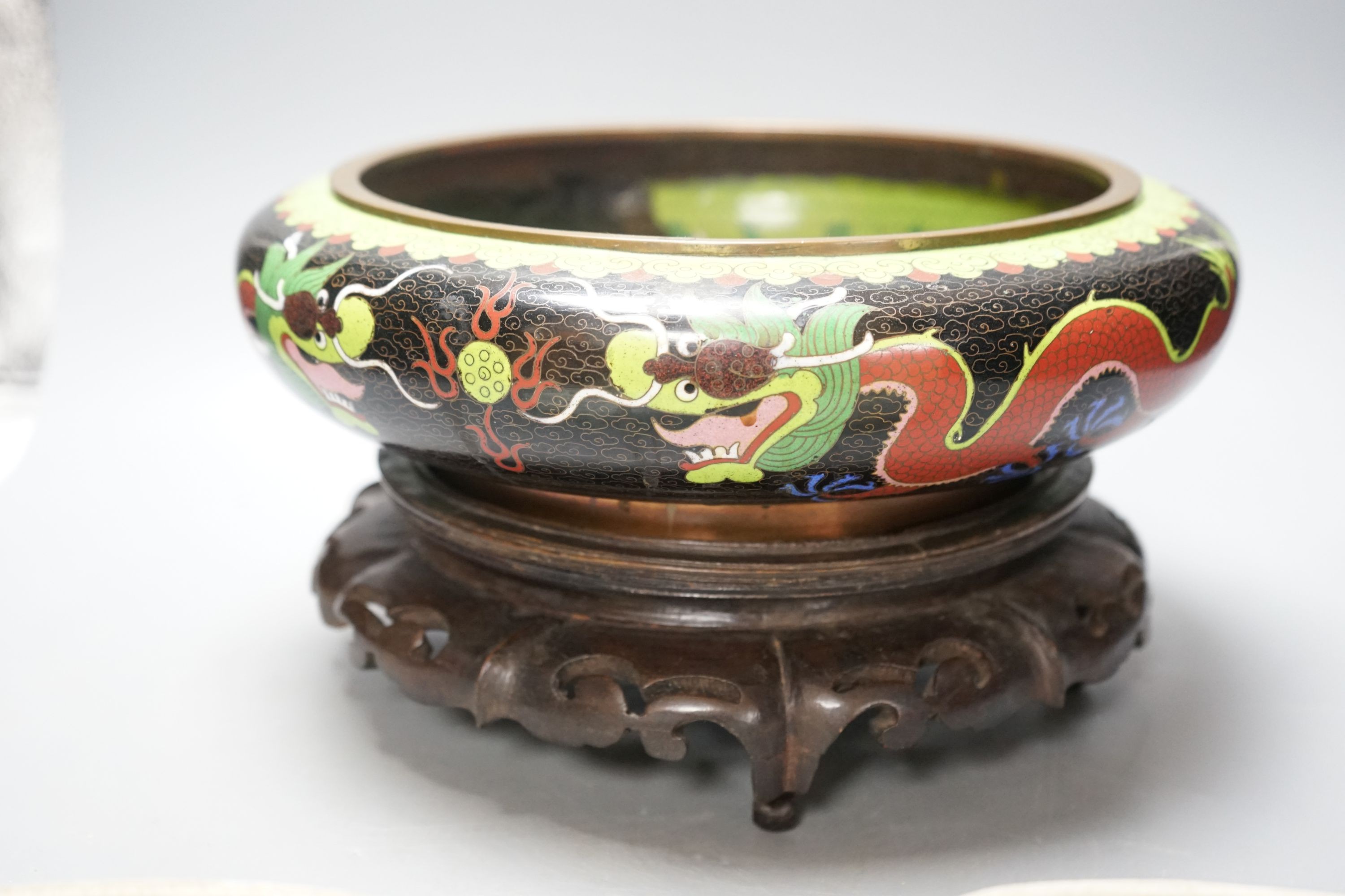 A large early 20th century Chinese cloisonné enamel ‘dragon’ bowl and two Chinese Tongzhi celadon ground famille rose bowls 31cm